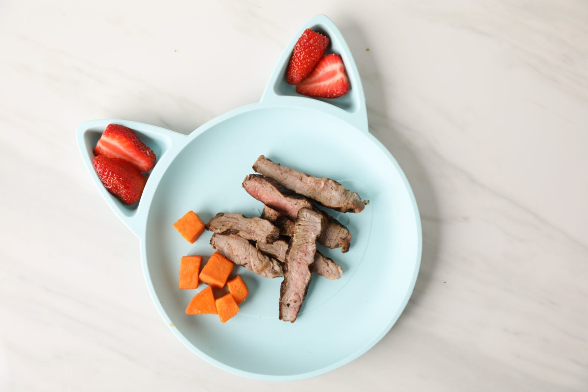 Baby plate with beef, fruit and vegetables